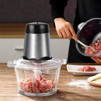 Hachoir electrique avec la viande intérieur